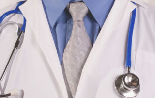 Doctor jacket and stethoscope.