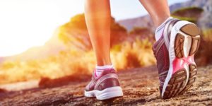 View of feet while running.