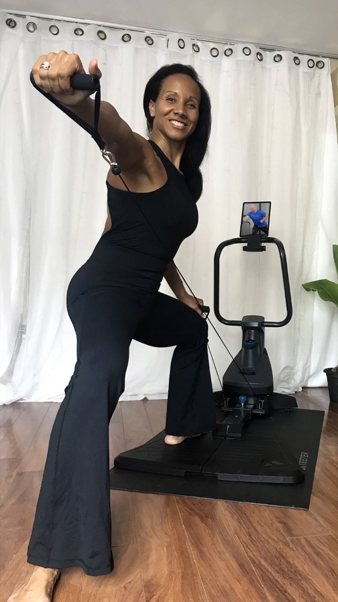 Teeter Move Community - Person On FitForm Exercising at home with Teeter Move App 