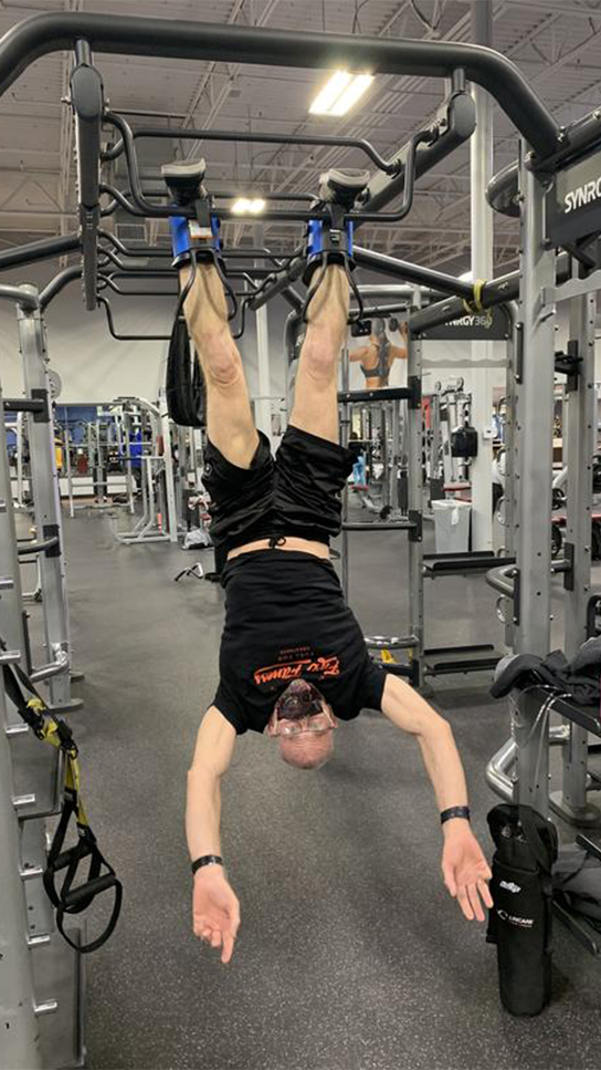 Real Teeter Customers - Person In gym using Gravity Boots