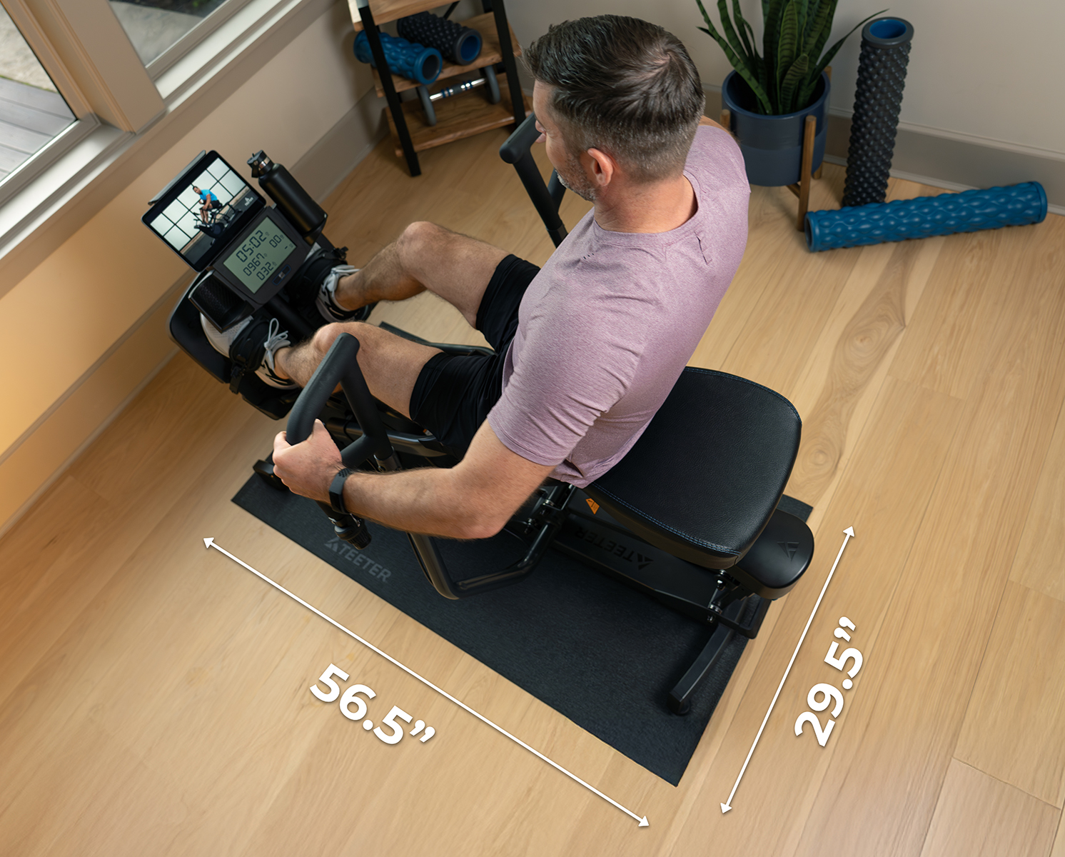 Person doing crunches on Teeter Inversion Table with Gravity Boots and Adapter Kit