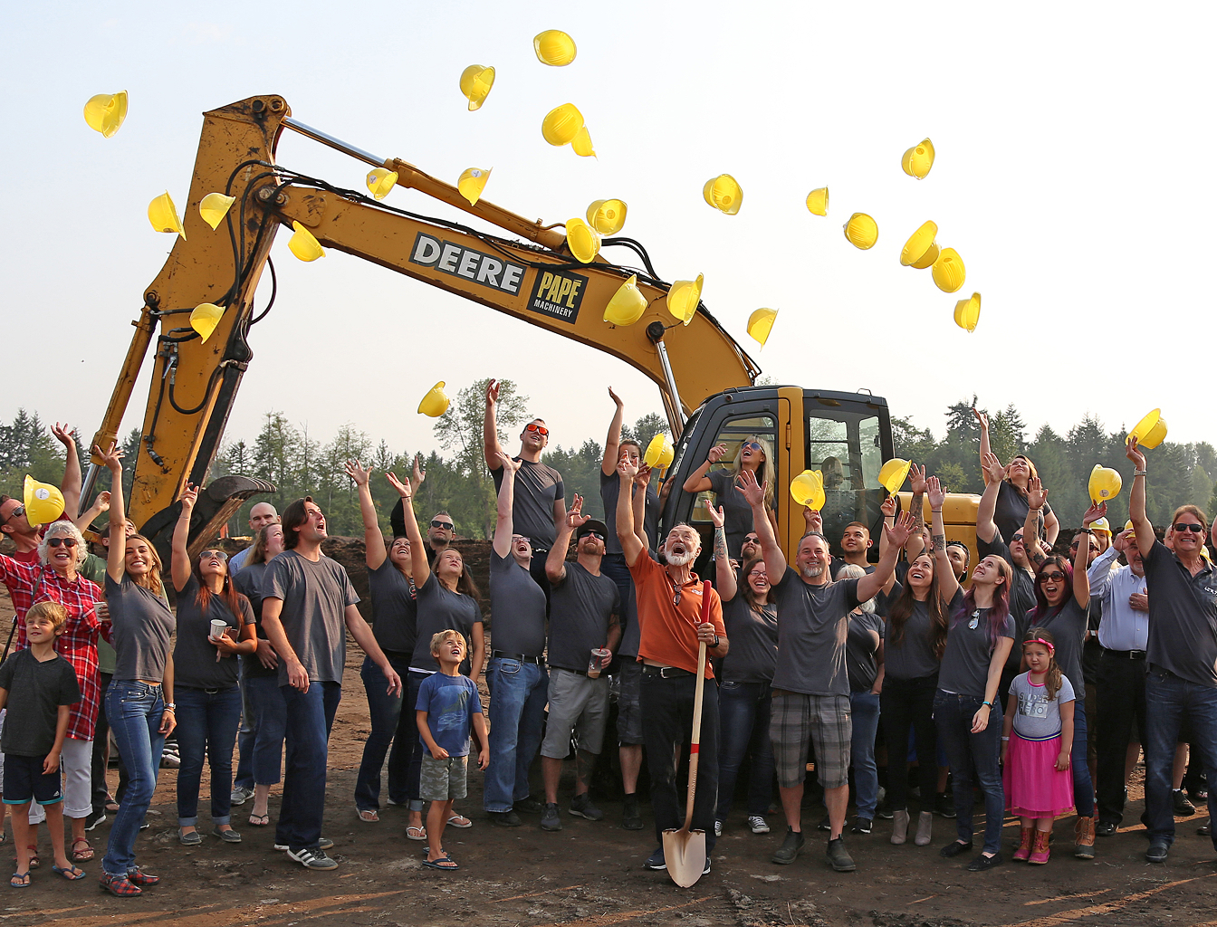 Teeter team celebrating during building ground breaking